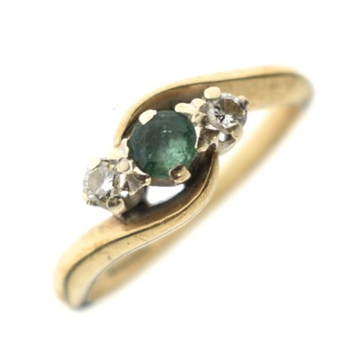 Lot 114 - Emerald and diamond crossover 9ct gold ring