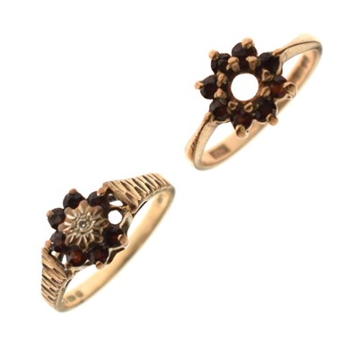 Lot 128 - Two garnet 9ct gold dress rings (a/f)