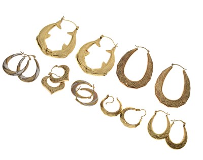 Lot 229 - Seven pairs of assorted gold and yellow metal hoop earrings
