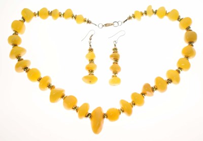 Lot 85 - Yellow hardstone bead necklace and earrings