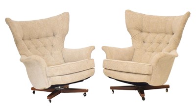Lot 65 - G-Plan pair of '62 Chair' swivel arm chair