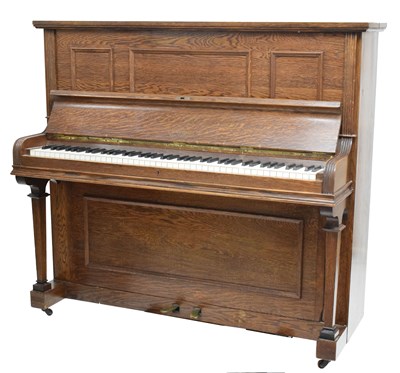 Lot 377 - Early 20th century oak cased iron framed upright piano