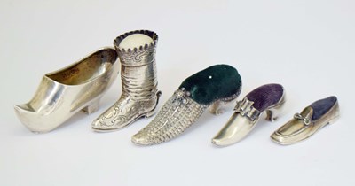 Lot 262 - Five silver novelty pin cushions, etc, each formed as a shoe