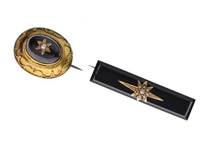 Lot 164 - Victorian garnet and seed pearl brooch, and an onyx and seed pearl bar brooch