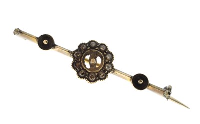 Lot 163 - Yellow metal and diamond brooch