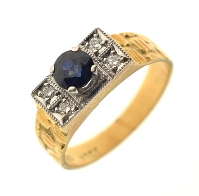 Lot 106 - Sapphire and diamond 18ct yellow metal ring