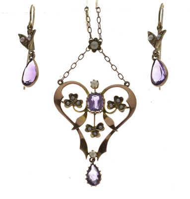 Lot 169 - Edwardian amethyst and seed pearl pendant necklace, and a similar pair of earrings