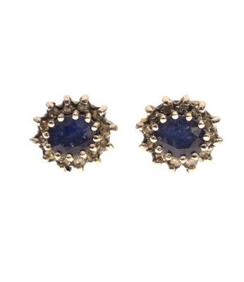 Lot 214 - Pair of sapphire and diamond 9ct gold cluster earrings