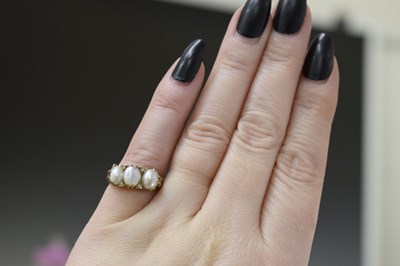 Lot 16 - Late 19th century pearl and diamond yellow metal ring