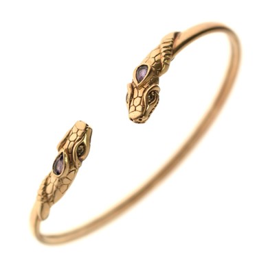 Lot 201 - 9ct gold torque bangle, the terminals modelled as serpents/snakes