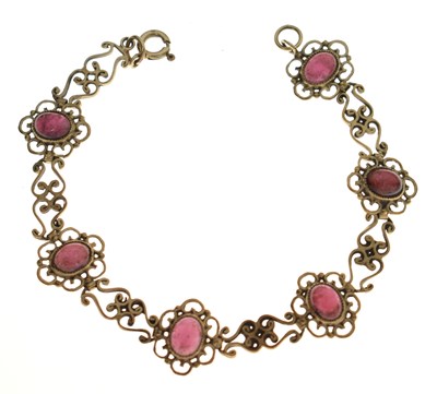 Lot 202 - Garnet 9ct gold panel bracelet