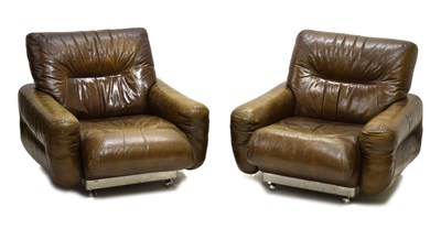 Lot 479 - Pair of 1970s stitched brown leather easy chairs by Roche Bobois, Paris