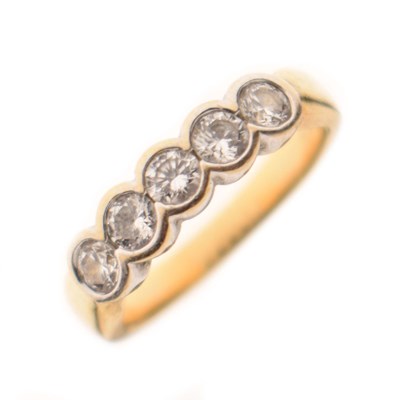 Lot 30 - 18ct gold five stone diamond ring
