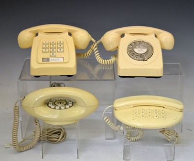 Lot 356 - Two 1980s cream BT telephones, a cream Genie phone, and a GeeMarc telephone