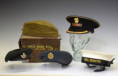 Lot 399 - Four military related caps