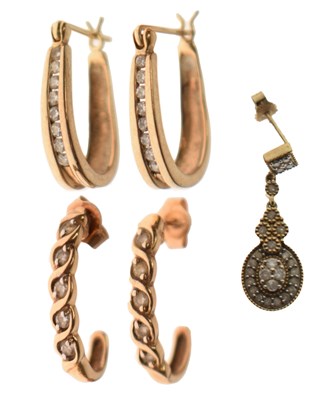 Lot 56 - Two pairs of 9ct gold and yellow metal and diamond earrings