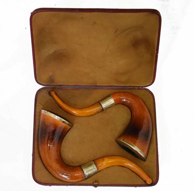 Lot 459 - Pair of Edwardian silver mounted and amber-tipped pipes