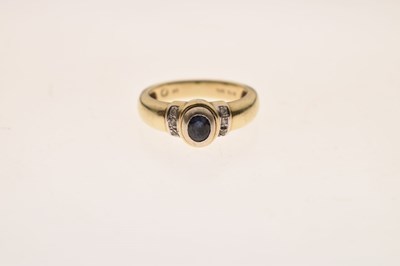 Lot 13 - Sapphire and diamond yellow and white metal ring, stamped '585'