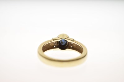 Lot 13 - Sapphire and diamond yellow and white metal ring, stamped '585'