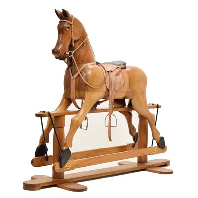 Lot 445 - Robert Mullins of Swindon - Polished American black walnut rocking horse