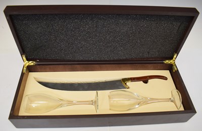 Lot 395 - Cased champagne sabre/sword and pair of flutes
