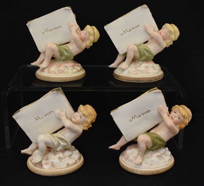 Lot 432 - Set of four Continental porcelain figural menu holders, circa 1900