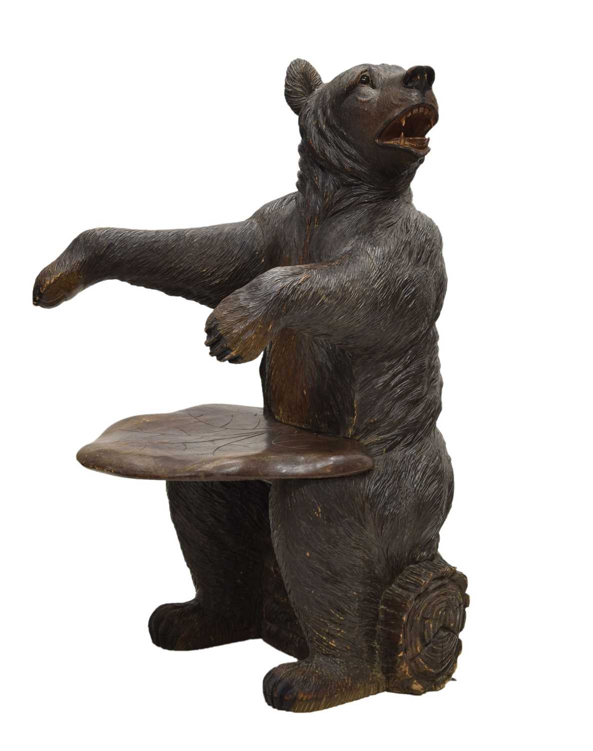 Lot 526 - Rare 'Black Forest' carved and stained wood hall chair in the form of a bear, circa 1900