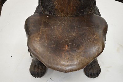 Lot 526 - Rare 'Black Forest' carved and stained wood hall chair in the form of a bear, circa 1900