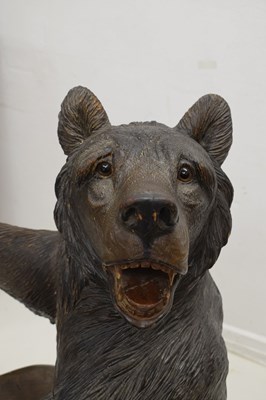 Lot 526 - Rare 'Black Forest' carved and stained wood hall chair in the form of a bear, circa 1900