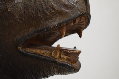 Lot 526 - Rare 'Black Forest' carved and stained wood hall chair in the form of a bear, circa 1900