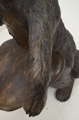 Lot 526 - Rare 'Black Forest' carved and stained wood hall chair in the form of a bear, circa 1900