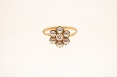 Lot 15 - Late 19th / Early 20th century diamond and pearl yellow metal flower head ring