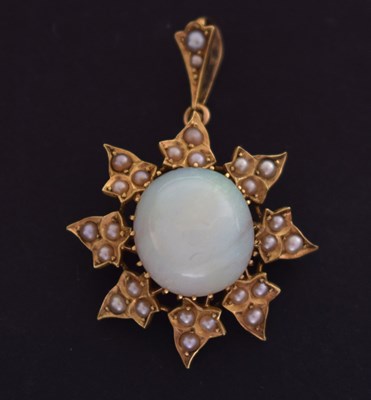 Lot 47 - Late 19th century opal and seed pearl unmarked yellow metal pendant brooch