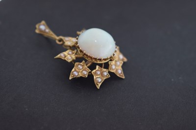 Lot 47 - Late 19th century opal and seed pearl unmarked yellow metal pendant brooch