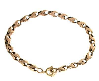 Lot 121 - Yellow metal fancy link bracelet, tagged '9c'