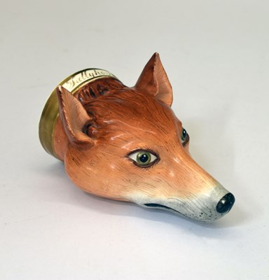 Lot 318 - Mid 19th century English porcelain fox mask stirrup cup