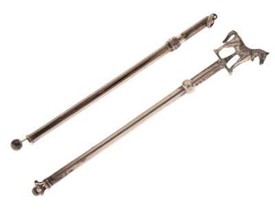 Lot 189 - Two swizzle stricks
