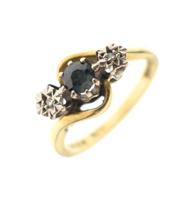 Lot 35 - Sapphire and diamond three-stone crossover 18ct gold ring