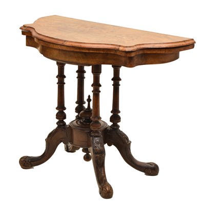 Lot 576 - Victorian walnut inlaid card table