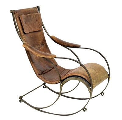 Lot 522 - Steel and tan leather rocking chair