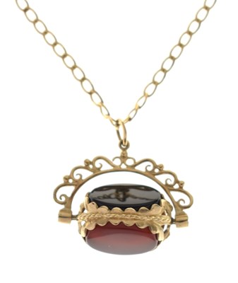 Lot 68 - Triple-sided hardstone swivel fob with a 9ct gold filed curb link necklace