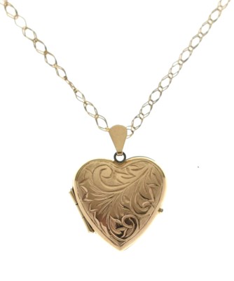 Lot 104 - 9ct gold heart-shaped locket and fine chain