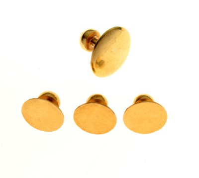 Lot 100 - Four unmarked yellow metal cufflinks or shirt studs