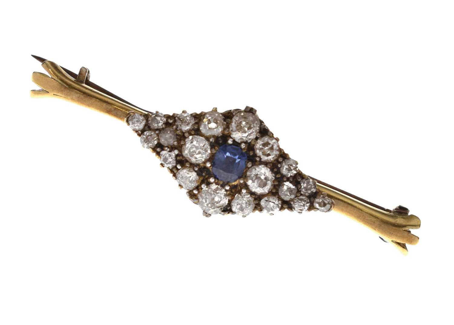 Lot 38 - Diamond and sapphire 18ct yellow metal brooch