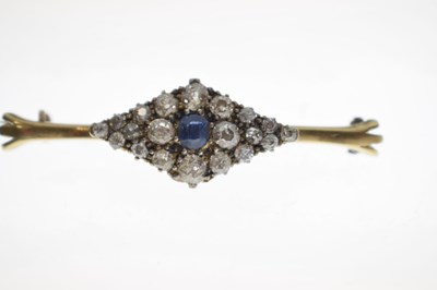 Lot 38 - Diamond and sapphire 18ct yellow metal brooch