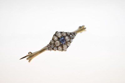 Lot 38 - Diamond and sapphire 18ct yellow metal brooch