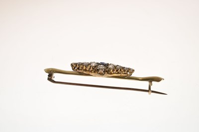 Lot 38 - Diamond and sapphire 18ct yellow metal brooch