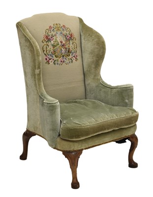 Lot 514 - George II walnut legged wing armchair