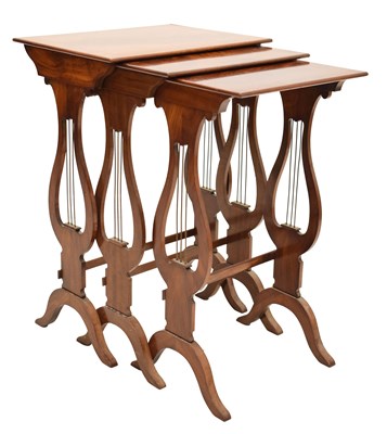 Lot 565 - Early 20th century mahogany nest of three occasional tables