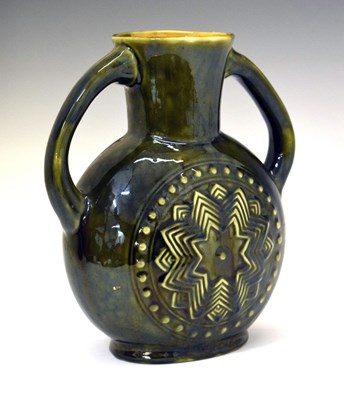 Lot 321 - Dr Christopher Dresser (1834-1904) for Linthorpe Pottery – Twin-handled vase